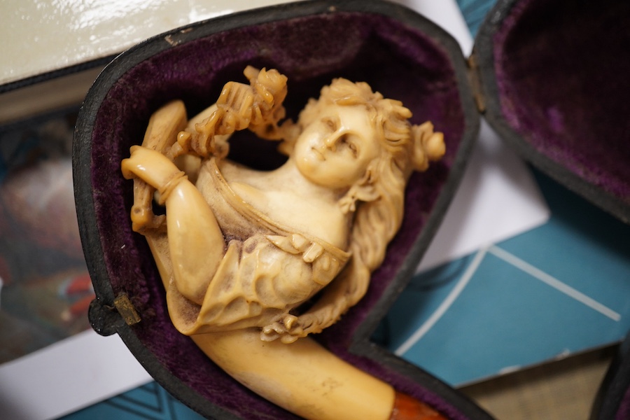 Six cased Meerschaum pipes and a cased amber and silver mounted pipe unused, together with smoking related books, longest pipe 17cm. Condition - most meerschaum pipes used therefore stained and smoking ends broken